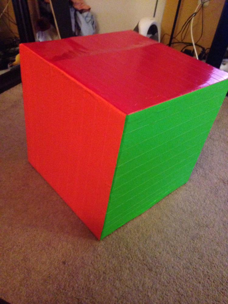 Because you can't just toss out a giant box when you can turn it into a giant color coded dice! #physed