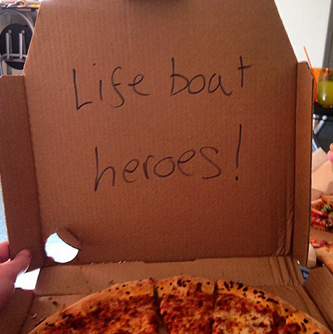 RNLI's tweet image. The @RNLI_Portsmouth crew were surprised to find a special message when they ordered pizza after training yesterday…