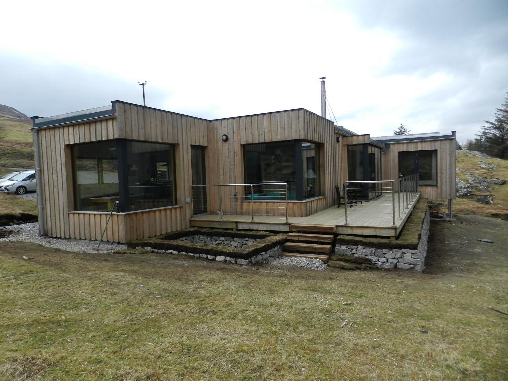 Check out the #drystone wall round the deck at #Sealoch House! And the cladding is weathering nicely too.