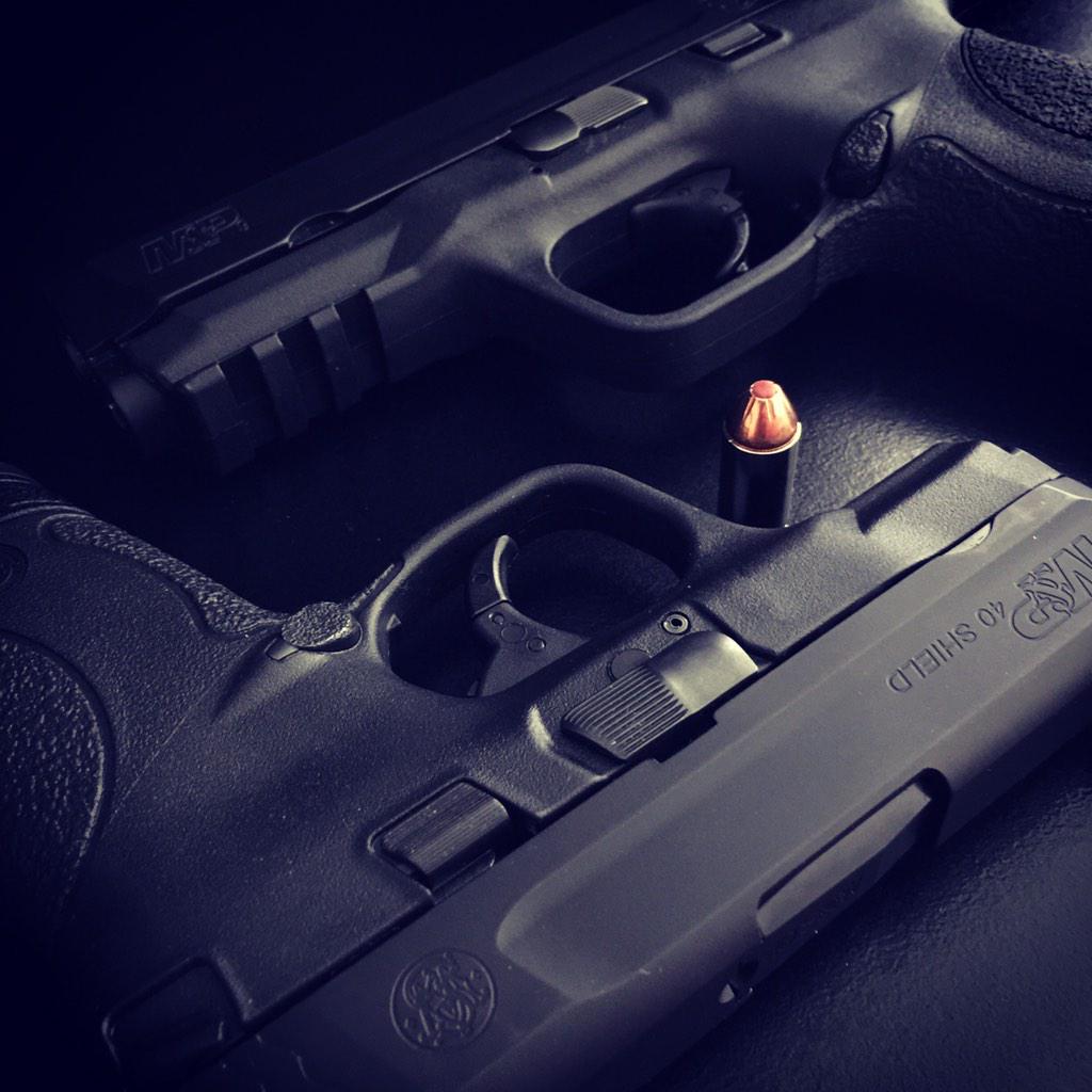 WoWMarketeer's tweet image. Partners in protection.  #smithandwesson #40cal #9mm #2a
