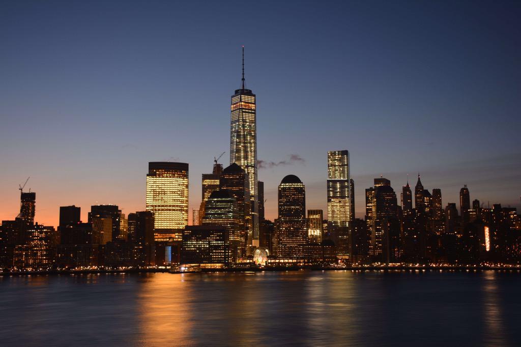 Love this shot of the #WTC and Lower #Manhattan reflecting on the Hudson River by <a href="/mark_tarello/">Mark Tarello</a> #NYC
