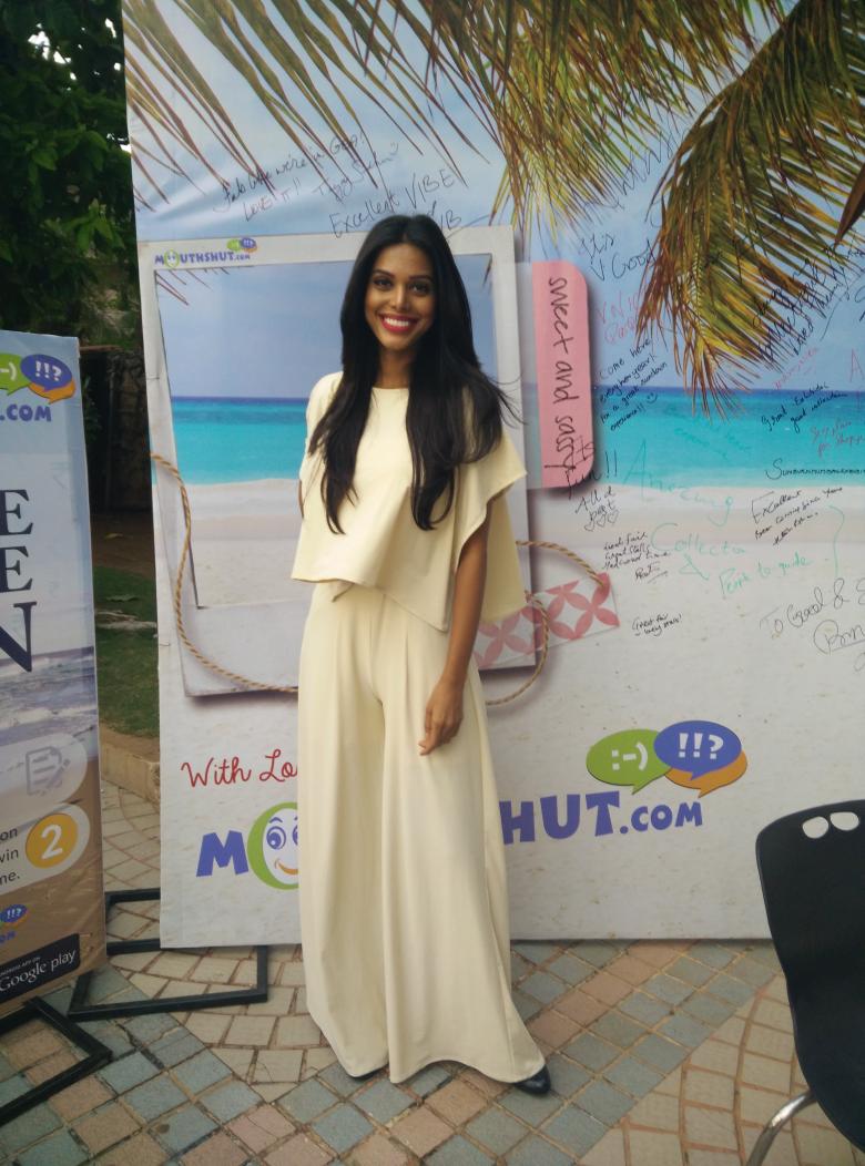 MouthShut's tweet photo. #NatashaSuri writes on the #MouthShutWall for #PrincessBeachFair http://t.co/fi0ixmBv6I