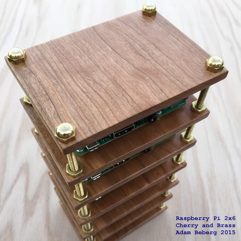 AdamBeberg's tweet photo. My 6-way @Raspberry_Pi 2 cluster. Brass and cherry edition. @make @chr1sa @Rob_Bishop http://t.co/yPivXbUBN4