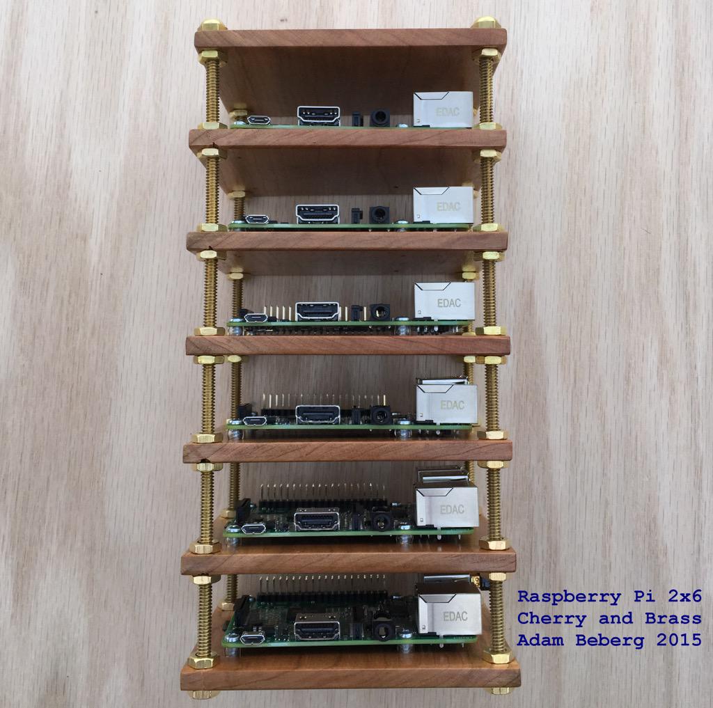 AdamBeberg's tweet photo. My 6-way @Raspberry_Pi 2 cluster. Brass and cherry edition. @make @chr1sa @Rob_Bishop http://t.co/yPivXbUBN4