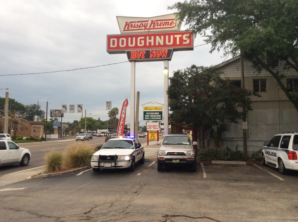 Cop car and hot donut lights. Stop by @krispykreme on Kennedy to support #CopsOnDonutShops for the Special Olympics
