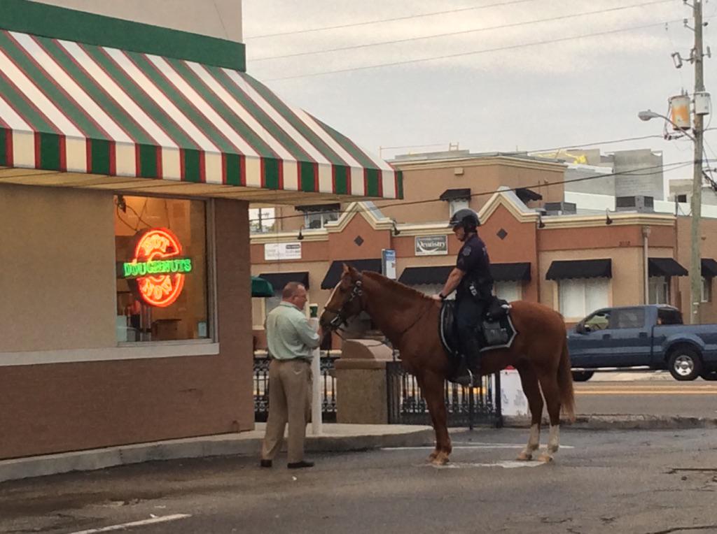 .@GingerGadsden @TampaPD: Red trotted up to @krispykreme on Kennedy Blvd 2 support #SpecialOlympics #CopsOnDonutShops