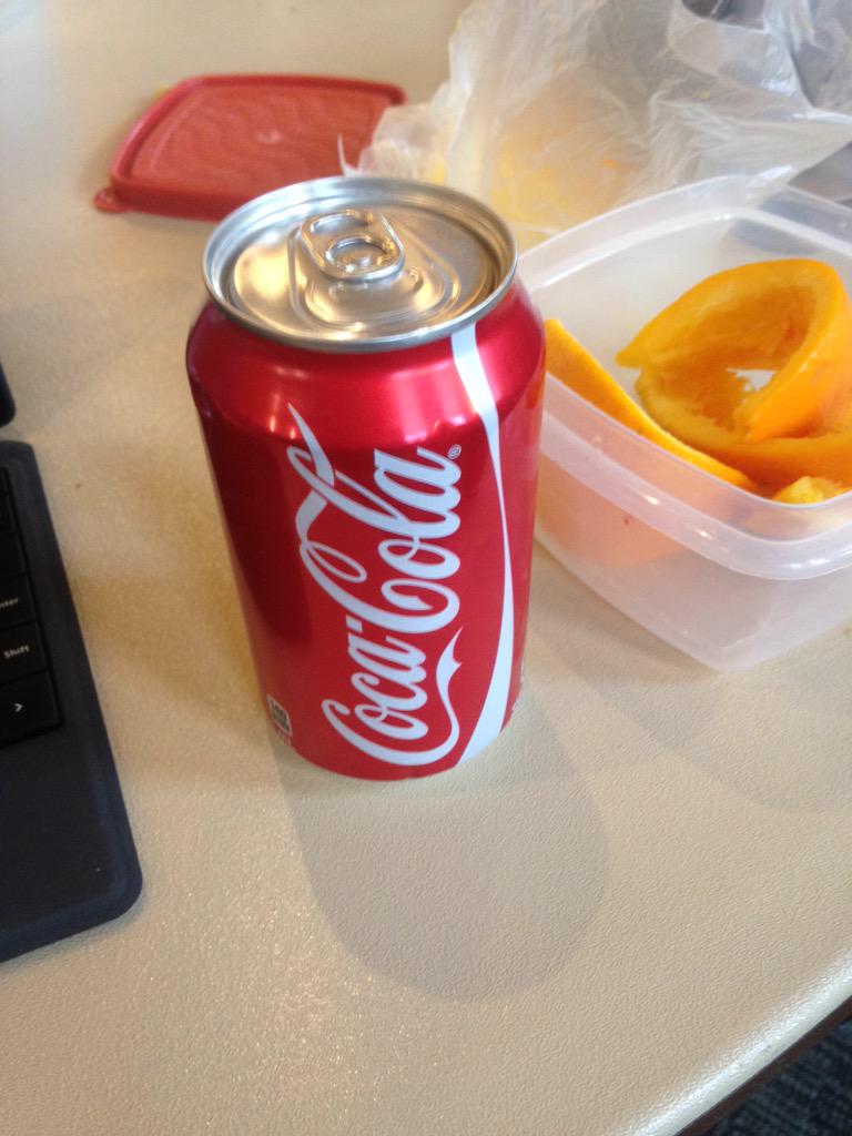 TurfJon's tweet photo. Free can of coke, all you have to do is give a hug. @uofg #bestthingever http://t.co/YppPRIdYbZ