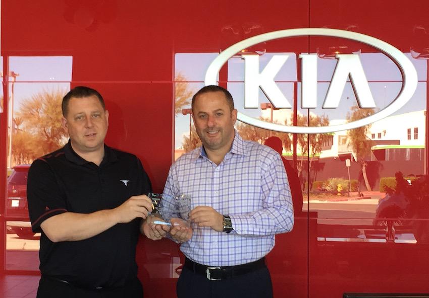 EdmundsPartner's tweet photo. Justin True &amp; Steve Cox proudly show off their 2015 #EdmundsFiveStarDealer Award for @RodeoKia http://t.co/RA6zg10Br8