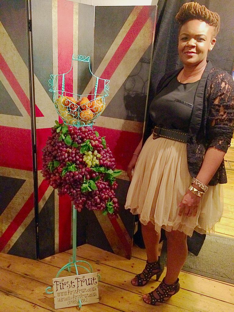 Sharleenloves's tweet photo. Creative Director Sharleen Cobourne posing next to her fabulous creation! #FF15 #BLFW #FruityCollection http://t.co/fkPZJw61yS