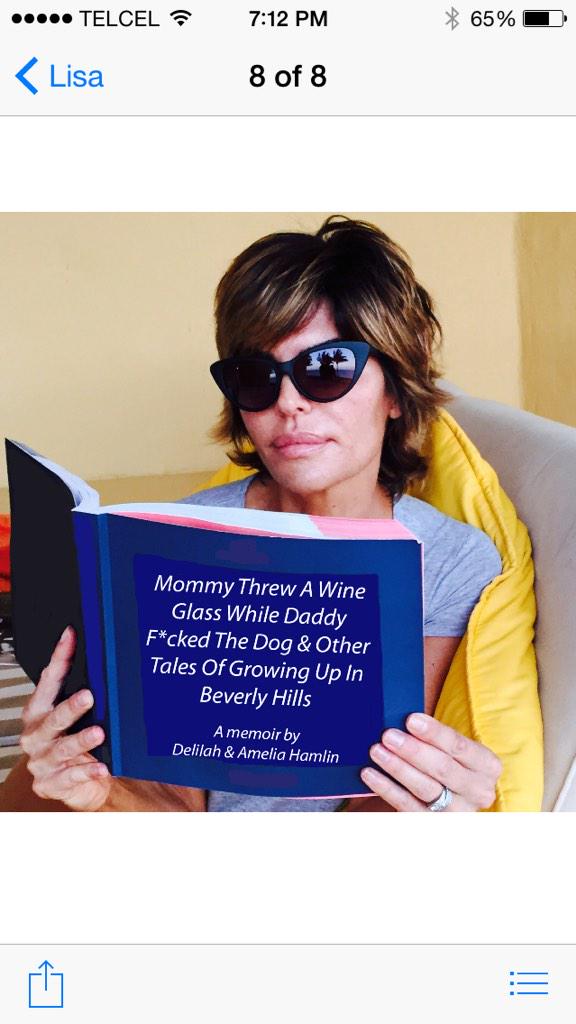 Caught the better half deep into her new favorite "tell all"! Puppy luv exposed! Darn. #WhatDidHarryDo