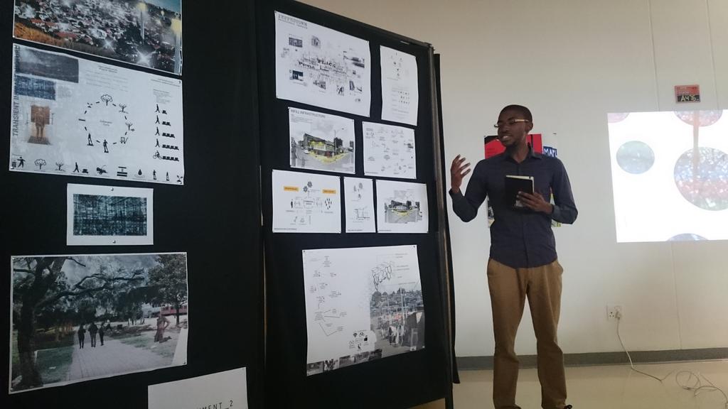 UJ_Unit2's tweet photo. Simon Ngubeni presenting his #unit_2 work at the Quarter 1 - Cross Unit Exhibition http://t.co/DbePnJJrb0
