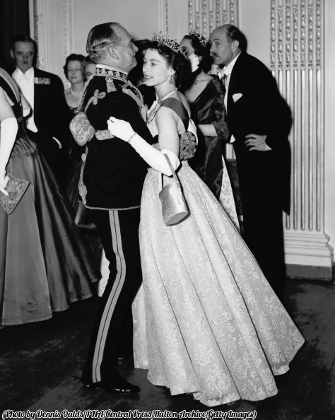 HistoryInPics's tweet photo. Queen Elizabeth II dances with an Air Marshal, 1954. http://t.co/rSYfQeEO9W
