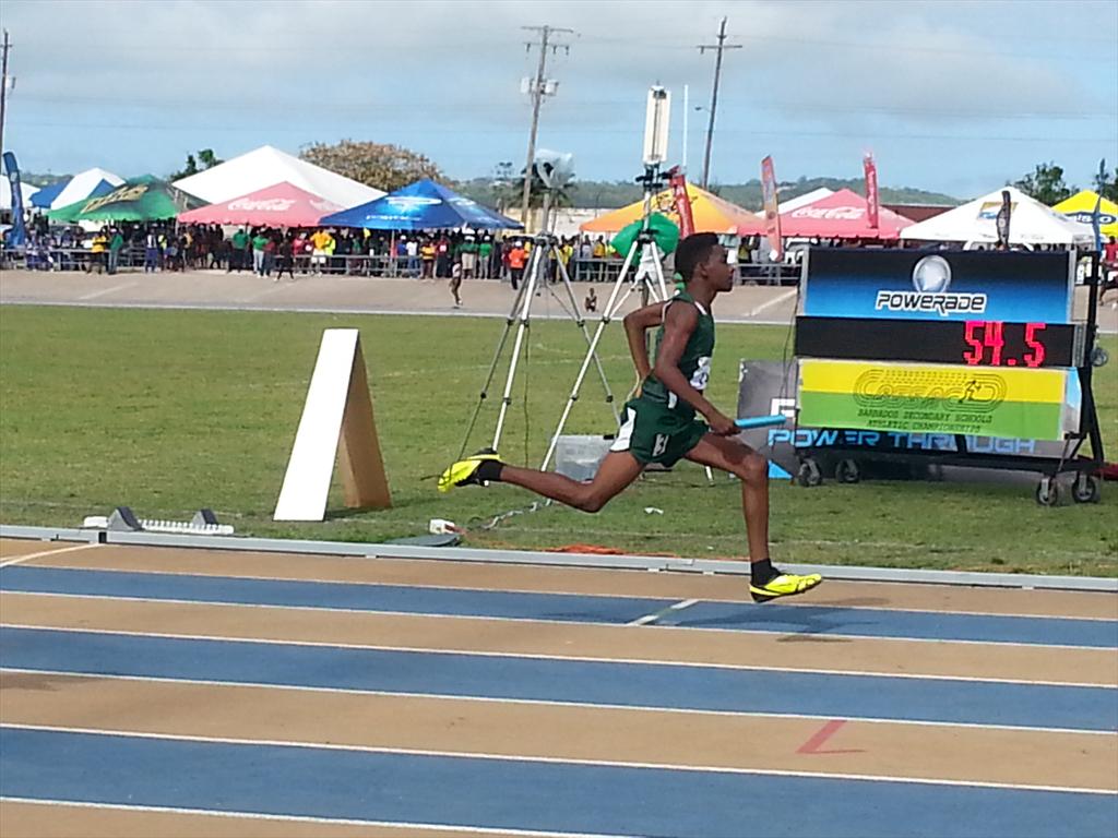 NationBarbados's tweet photo. #BSSAC2015: Lester Vaughan take the U13 boys 4x100m relay. http://t.co/lJXIlJzjPh
