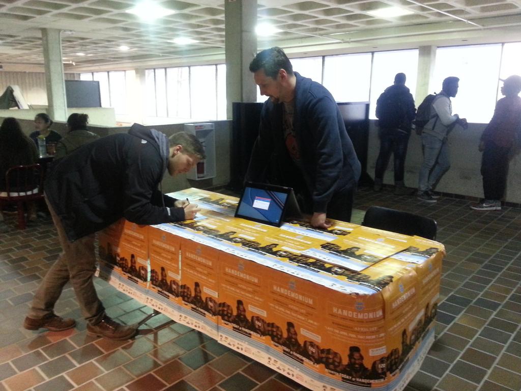 HandemoniumWPG's tweet photo. Signing students for Handemonium.ca @ UofM. Giant rock, paper, scissors tourney + 15 fun Minute to Win It games! http://t.co/IbcdHdYo2z