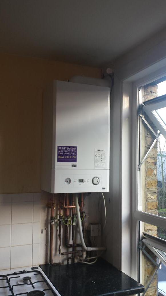 PlumbPrestige's tweet photo. After pic of new heatline boiler installed yesterday in replace of the immediately dangerous old boiler . http://t.co/d0kFJ01ryf