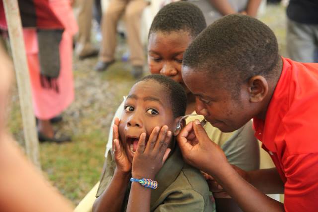 starkeyhearing's tweet image. During @starkeycares' mission in Malawi, Rabson reacts to his restored hearing, which he had lost due to malaria.