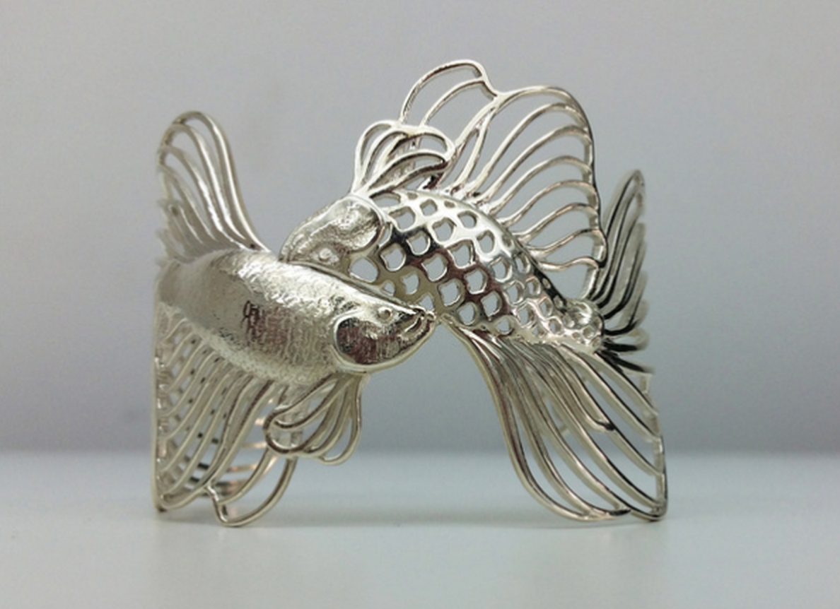 shapeways's tweet image. Pisces pendant 3D printed in premium silver by NeoNouveau: shpws.me/w0X9
