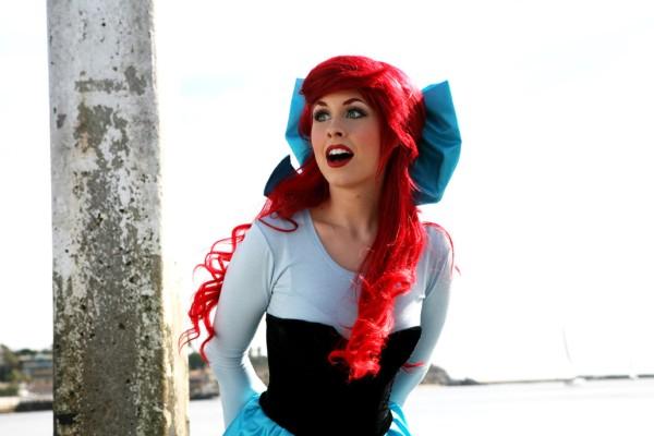 Ariel smiled as she made her way down the board walk as the light breeze blew through her bright red hair. The smell-