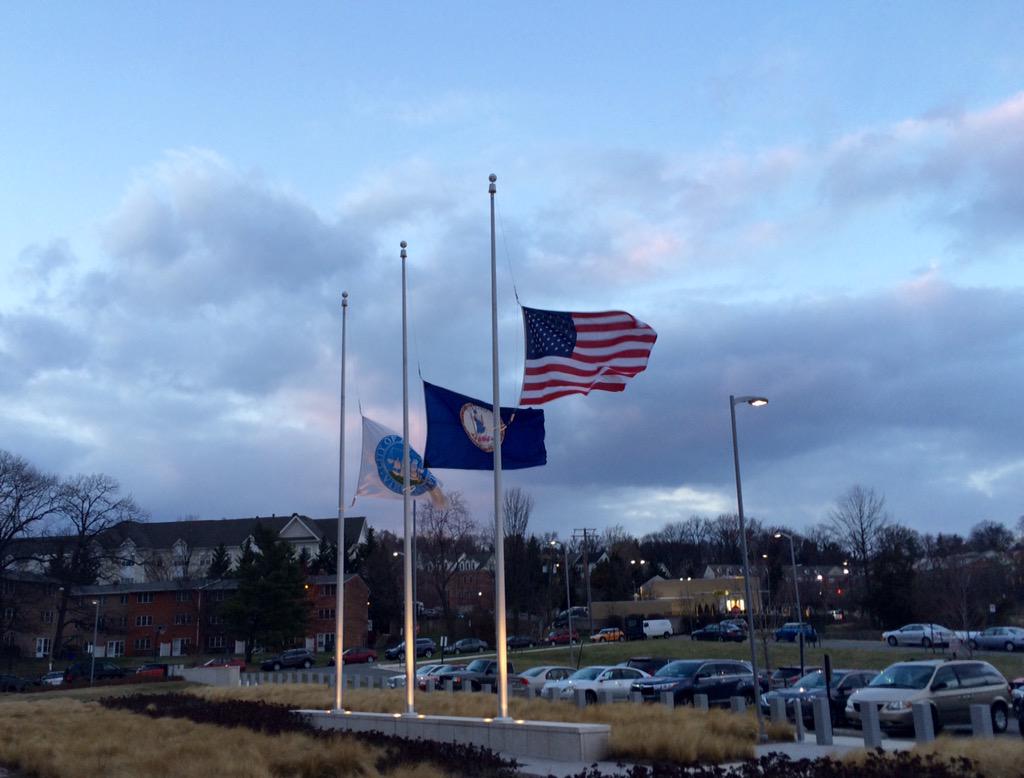 AlexandriaVAPD's tweet photo. The flags are lowered by APD Honor Guard in anticipation of the ceremony moving outdoors. #APMemorial http://t.co/LJmB6AxFRq