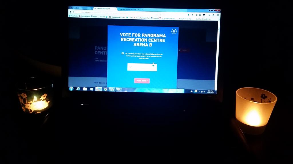 kimmanton's tweet image. Laptop unplugged, lights out and voting #NorthSaanich #KHV2015 by candlelight #EarthHour2015