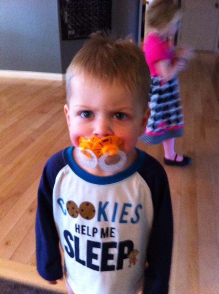 smitt14's tweet photo. The boy won't give up on the soothers. http://t.co/a2xvjrIH2I