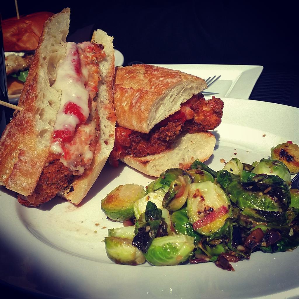 Perfect for lunch - Chicken Parm sandwich with Roasted Brussel Sprouts! #uptownclt #clteats
