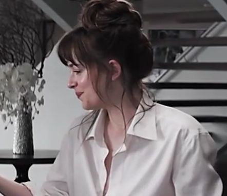 Whenever she looks at Christian, she smiles.