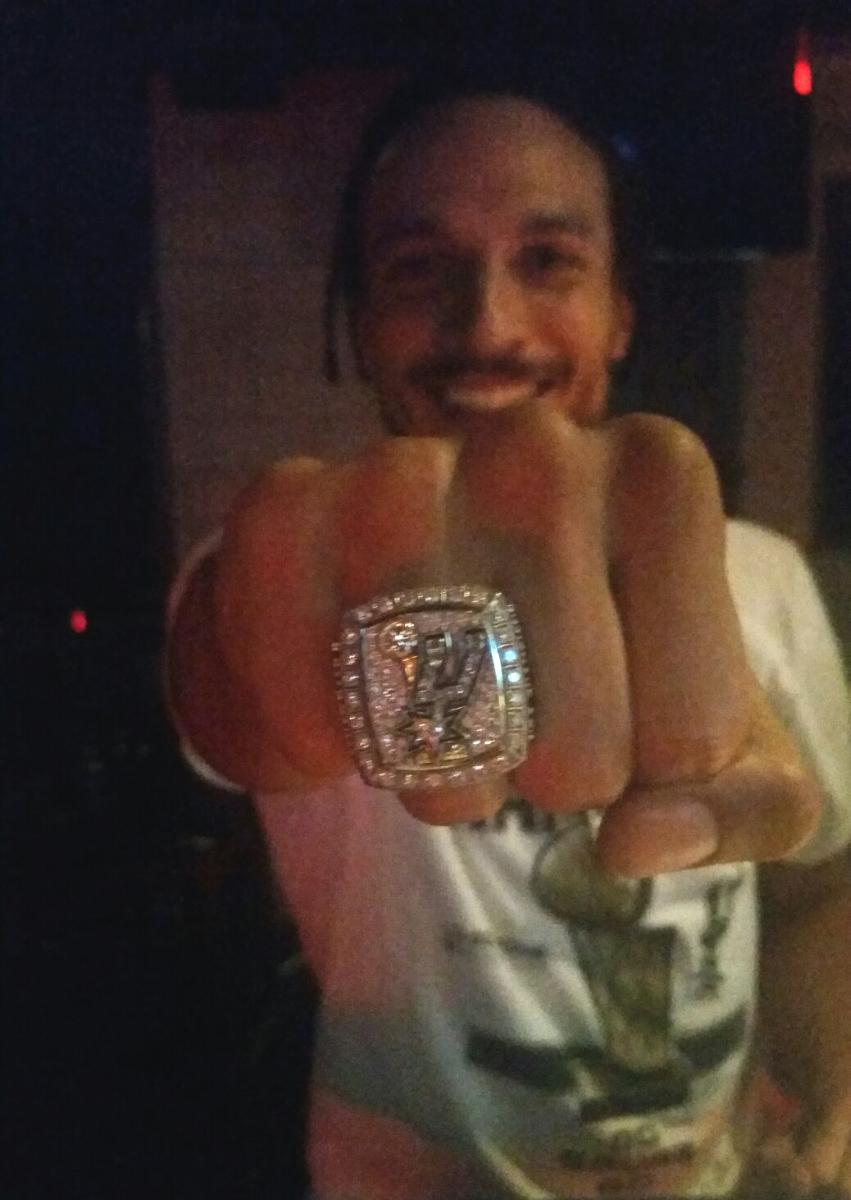 Earthdriver's tweet image. Earthdriver.org CEO Jeremiah Hosea wearing an actual Spurs Championship Ring! #gospursgo #SHIFT411