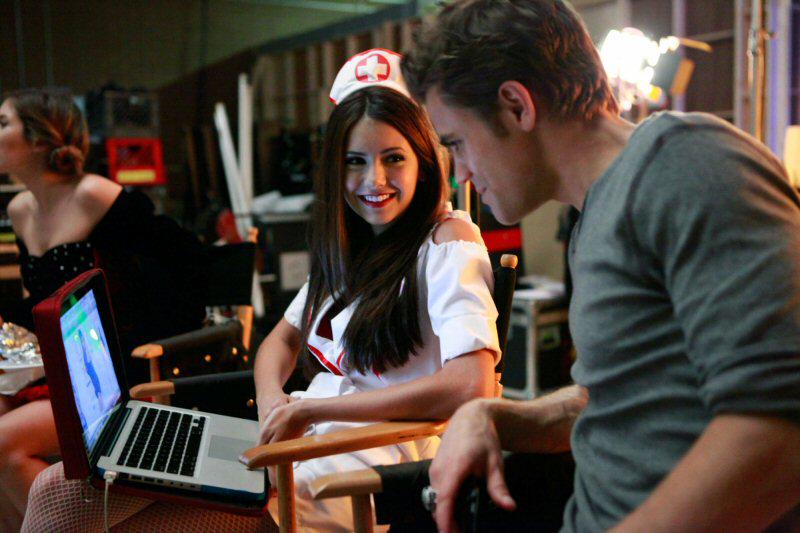 look at what is on nina's laptop, it's a picture of her, d'aw.