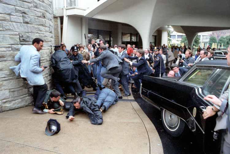 OurPresidents's tweet photo. Secret Service agent @Jerry_Parr immediately pushed Reagan into the Presidential car: http://t.co/fsckphwJ7D http://t.co/weo4Z0UmAz