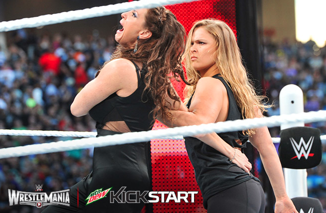 WWE's tweet photo. A #WrestleManiaMoment was made as @TheRock &amp; @RondaRousey confronted @TripleH &amp; @StephMcMahon! http://t.co/EfN75FreLJ http://t.co/jotXx9cHJR