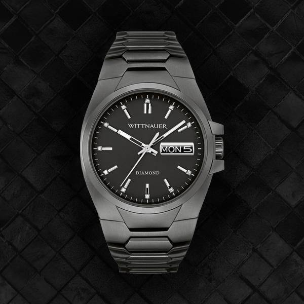 Monday means business. A stainless steel gunmetal finish with hand-set diamonds; this is for living in the fast lane.