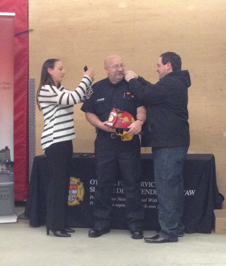 Sue_E_J's tweet photo. Capt Gary Rocky Rockburn humbly receiving his epaulettes from his children! @OttFire @District8Chief http://t.co/FrPPpGEY8U