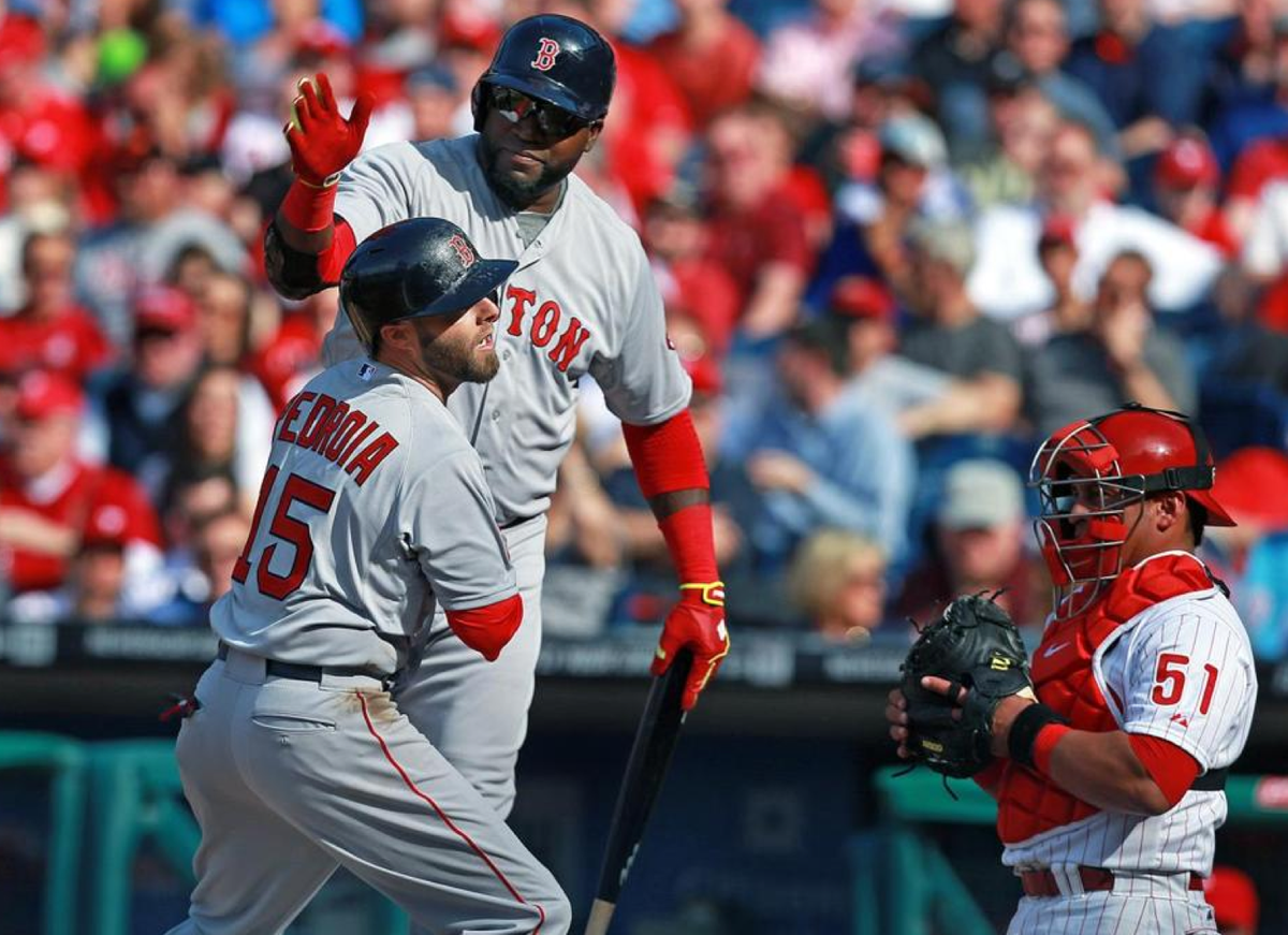BostonGlobe's tweet photo. Dustin Pedroia makes a powerful statement for Red Sox on Opening Day, writes @nickcafardo http://t.co/P7cUCY3Jk6 http://t.co/yWx5bJn5sT