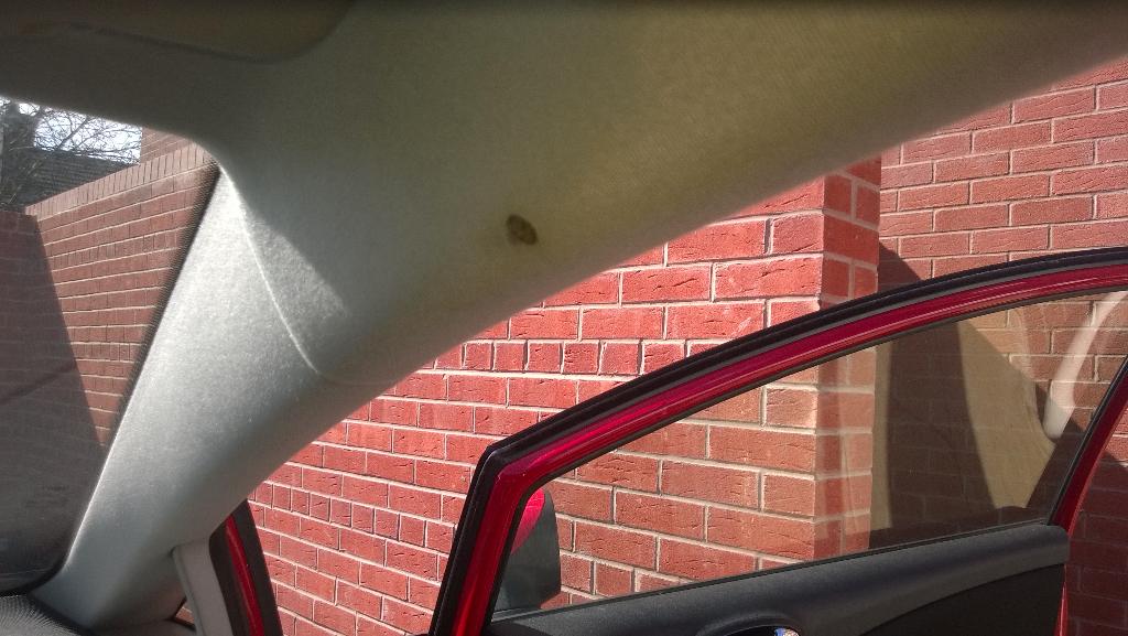 interiorrepair's tweet photo. Cigarette burn to headliner before http://t.co/gy1RhUFYOv