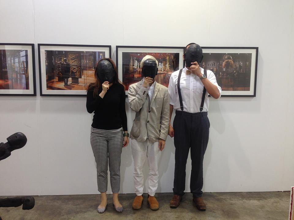 With Shuyin Yang of Christie's and artist Jay Yao at the recent Art Basel HK, interacting with Gaston Damag's masks.