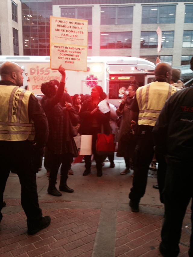 KMJwnew's tweet photo. Crowd of protests outside of @TheLincolnDC for @MayorBowser first State of the Address. #SODA15 http://t.co/M8aFZtmE8Z