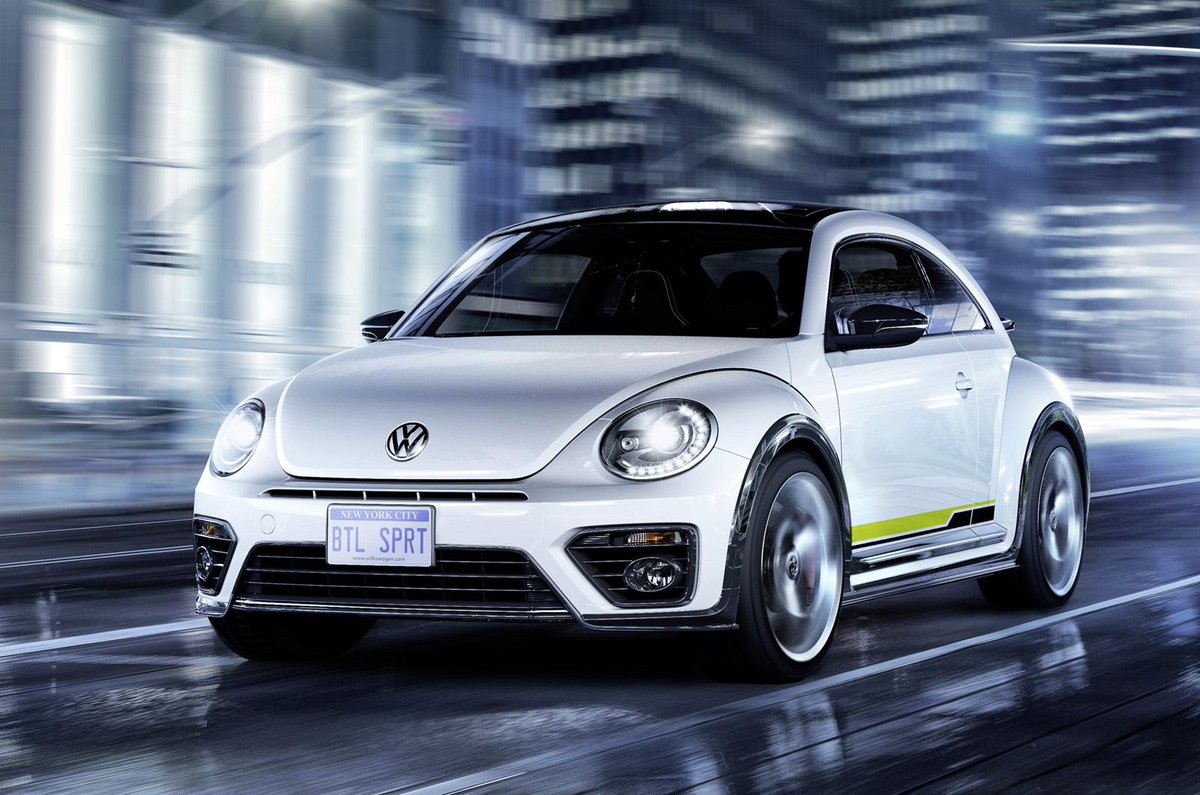 autocar's tweet photo. No less than 4 new Volkswagen Beetle concepts. Pink, Wave, R-Line and Denim. #NYIAS http://t.co/2VFRMdxiT1