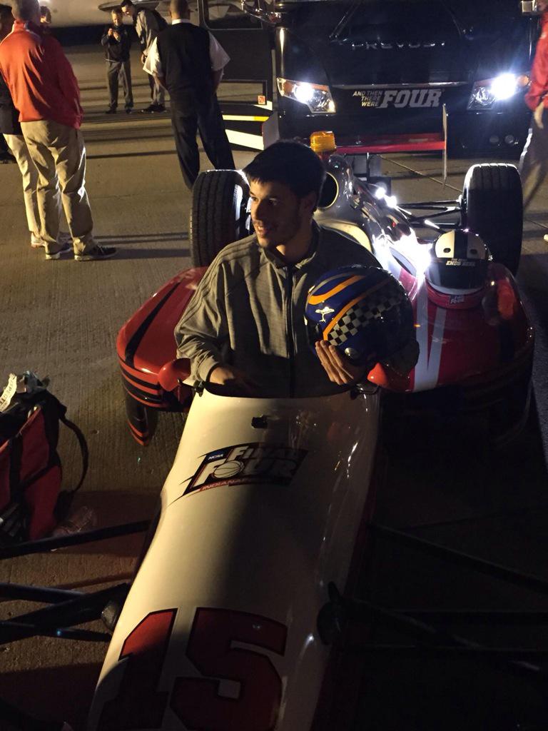 MarchMadnessMBB's tweet photo. Getting a basketball player into an IndyCar is not easy. #FinalFour http://t.co/DvUyZiP4y7