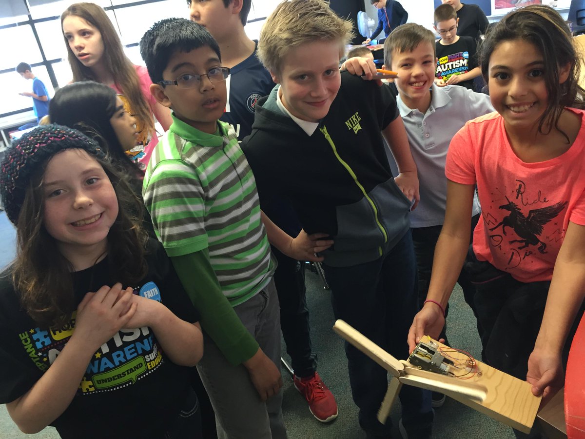 WebsterACAT's tweet photo. Family 3 students testing windmill blade designs. Can they get enough power to turn on the light? http://t.co/qYs7Pas2Cv