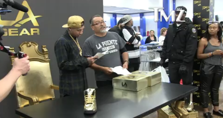 WRBolen's tweet image. Rapper @Tyga was served at his own shoe release by the Michael Jordan of process servers: ow.ly/L84wg