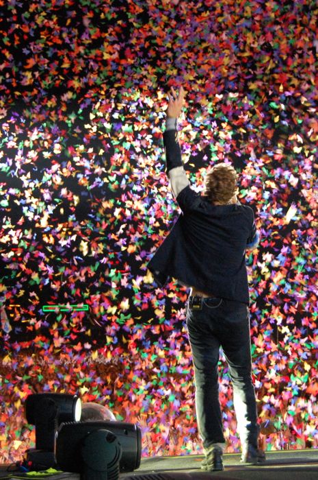 coldplay's tweet image. Here's a #TBT pic from the band's performance at Roskilde Festival in 2009. A