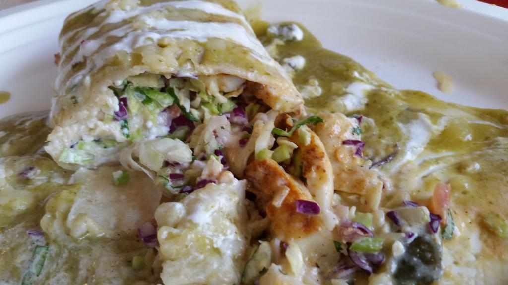 I'm loving my Calamari Buttito with green sauce at #TacoMesa in #LakeForestCA.No food truck today. #NTXFTA road trip.