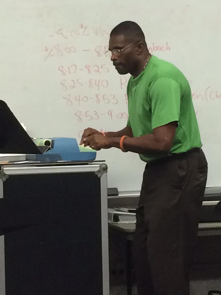 Dr. Chapman practicing on an ACTUAL TYPEWRITER for our next concert... What are we playing? Any guesses??
