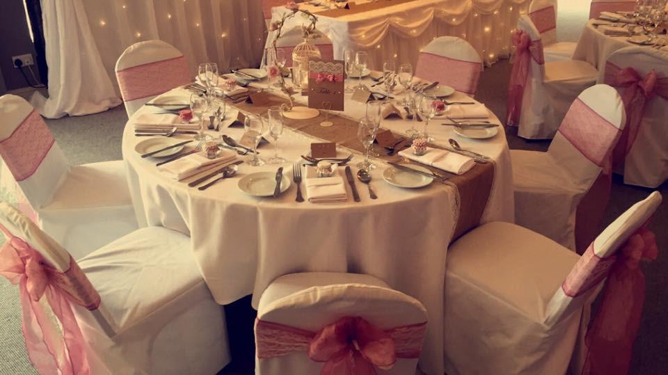 Fab table setting at our latest wedding! Antique pink sashes with lace overlay, and hessian table runners! #Weddings