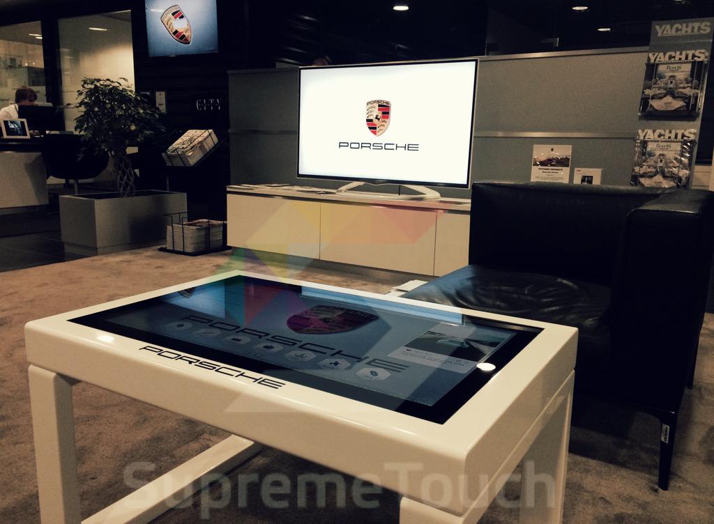 SupremeTouch's tweet photo. Customized #Corian #multitouch table for #Porsche waiting room. @SnowflakeSuite makes waiting fun and informative. http://t.co/bwvXvENAo2