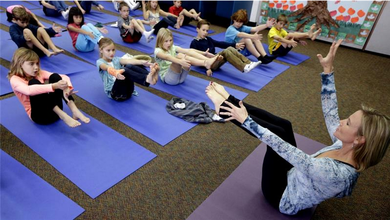RevRoutine's tweet image. Add yoga to your #RevRoutine! US courts just ruled in favor of school yoga classes. bit.ly/1EWwemo