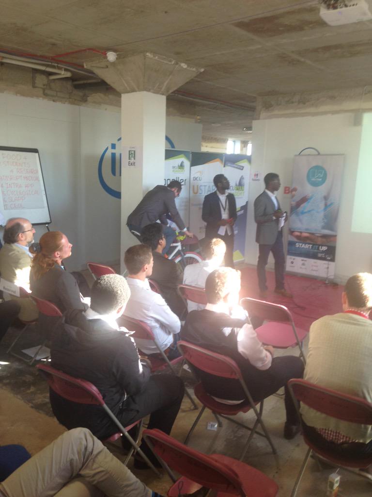 HackDCU's tweet photo. And off they go! Great physical demo on the bike! 5th presentation 'Cycleogical' is turning heads ! #HackDCU http://t.co/l0X3lsaKA2