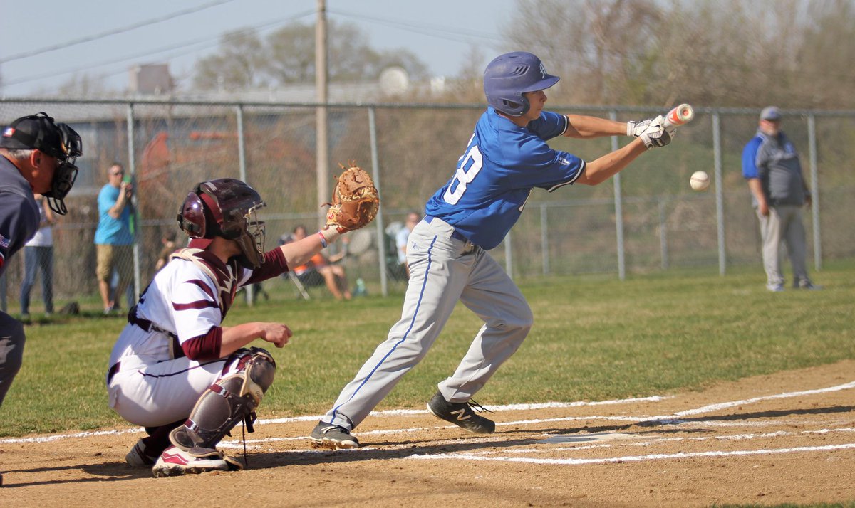 TheFanVSN's tweet photo. Jarrett Bickel puts down a sacrifice bunt for @Baseball_Marian today in #Mishawaka http://t.co/pa8fJHRBP4