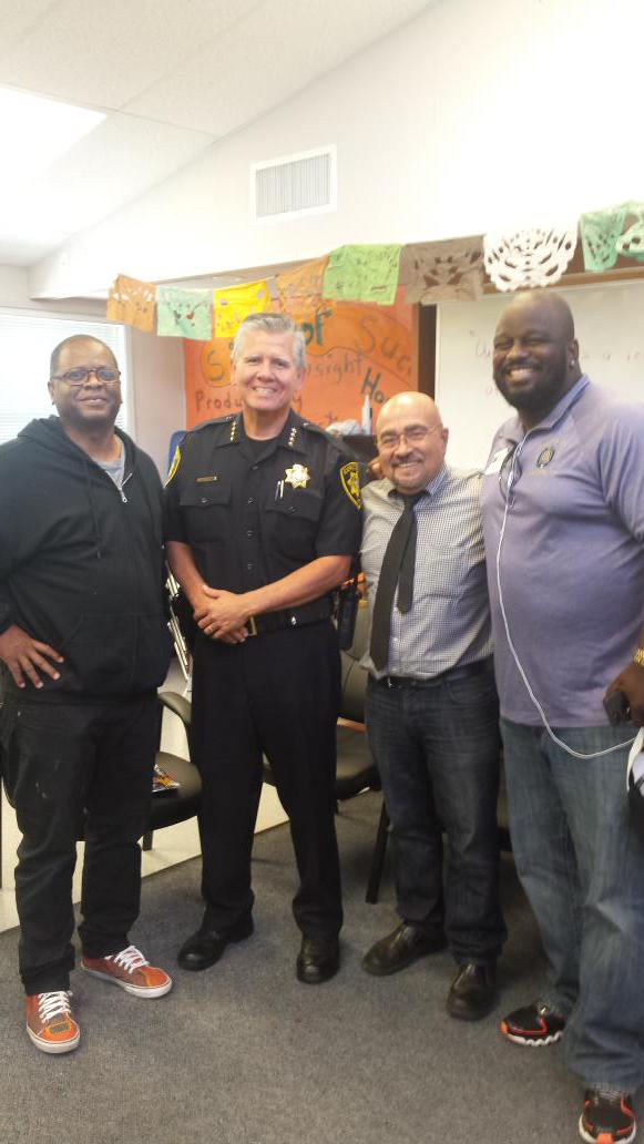 Chief Swanger, Dr. Rivera, Mr. Mc Wilson and Mr. Lopes collaborate to develop social programs for students at OHS.